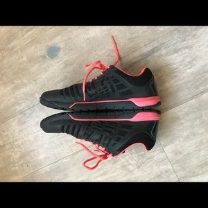 Black and coral Reebok Nanos