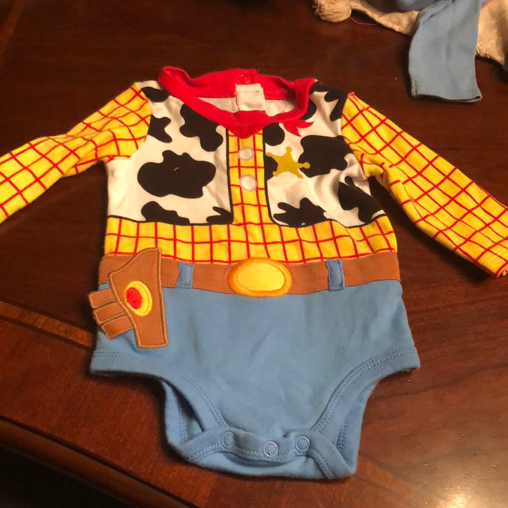 Woody form toy story onesie size 6-9