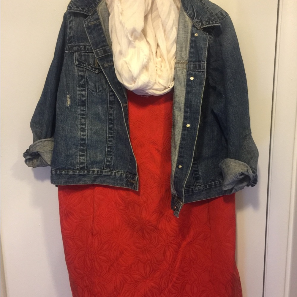 Orange knee length (embroidered design) dress.