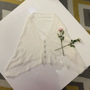 Multi use soft scarf with buttons.