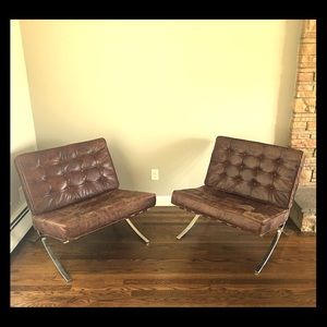 Italian leather cigar chairs.