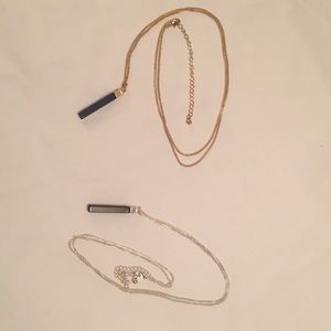 Two necklaces: blue/gold and black/silver