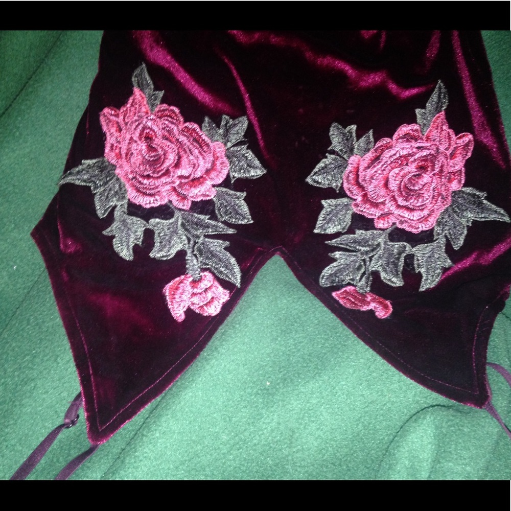 Size medium Worn once a burgundy velvet dress