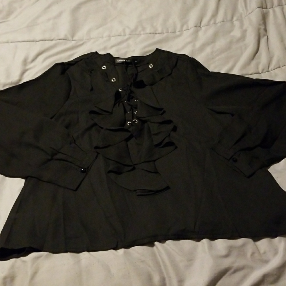 Size L sexy, sheer ruffled blouse.