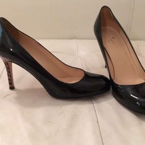 Black Kate Spade pumps with leopard heel