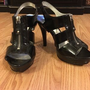 Carlos “Decadent” zip front heels