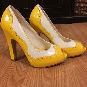 Yellow and white peep toe heels