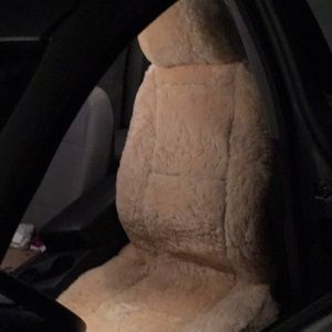 Plush cream colored seat cover