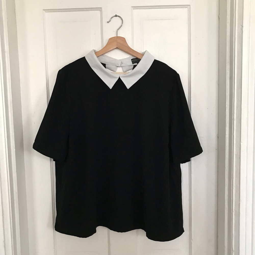 black blouse with white collar and keyhole back