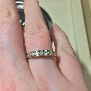 14k two tone channel set diamond scroll work ring