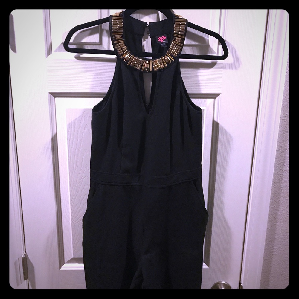Bebe black jumpsuit with gold beading