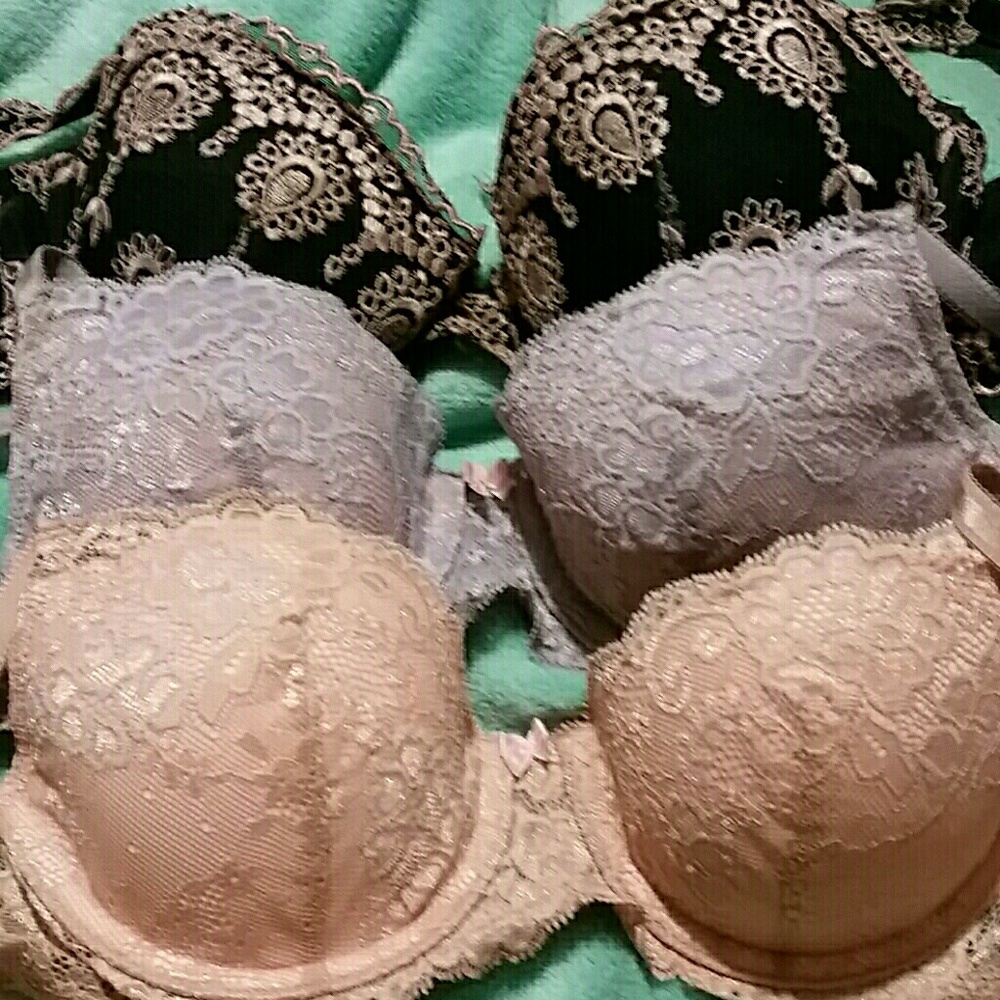 Three push up plunge bras; two Victoria's Secret