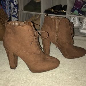 Brown lace up booties Size 7.