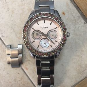 Fossil women’s watch with stones around face