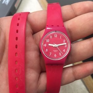 Hot pink Swatch watch-waterproof