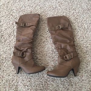 Knee high heeled boots
