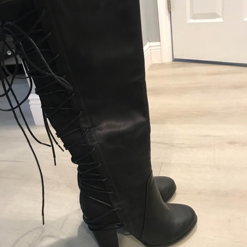 Tall black boots never worn