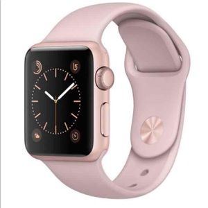 Apple Watch series 1 rose gold athletic band.