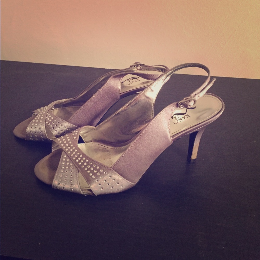Sling back silver heels with rhinestones