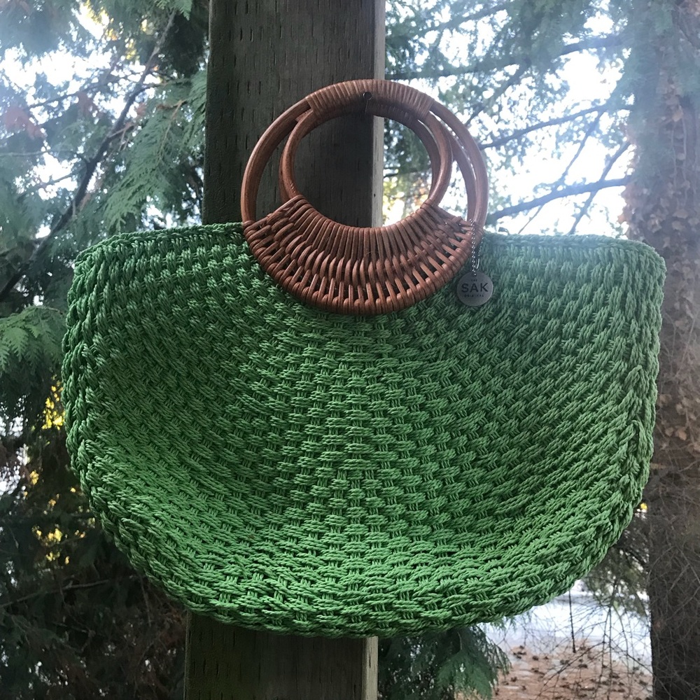 The Sak Original sea green wicker style bag.