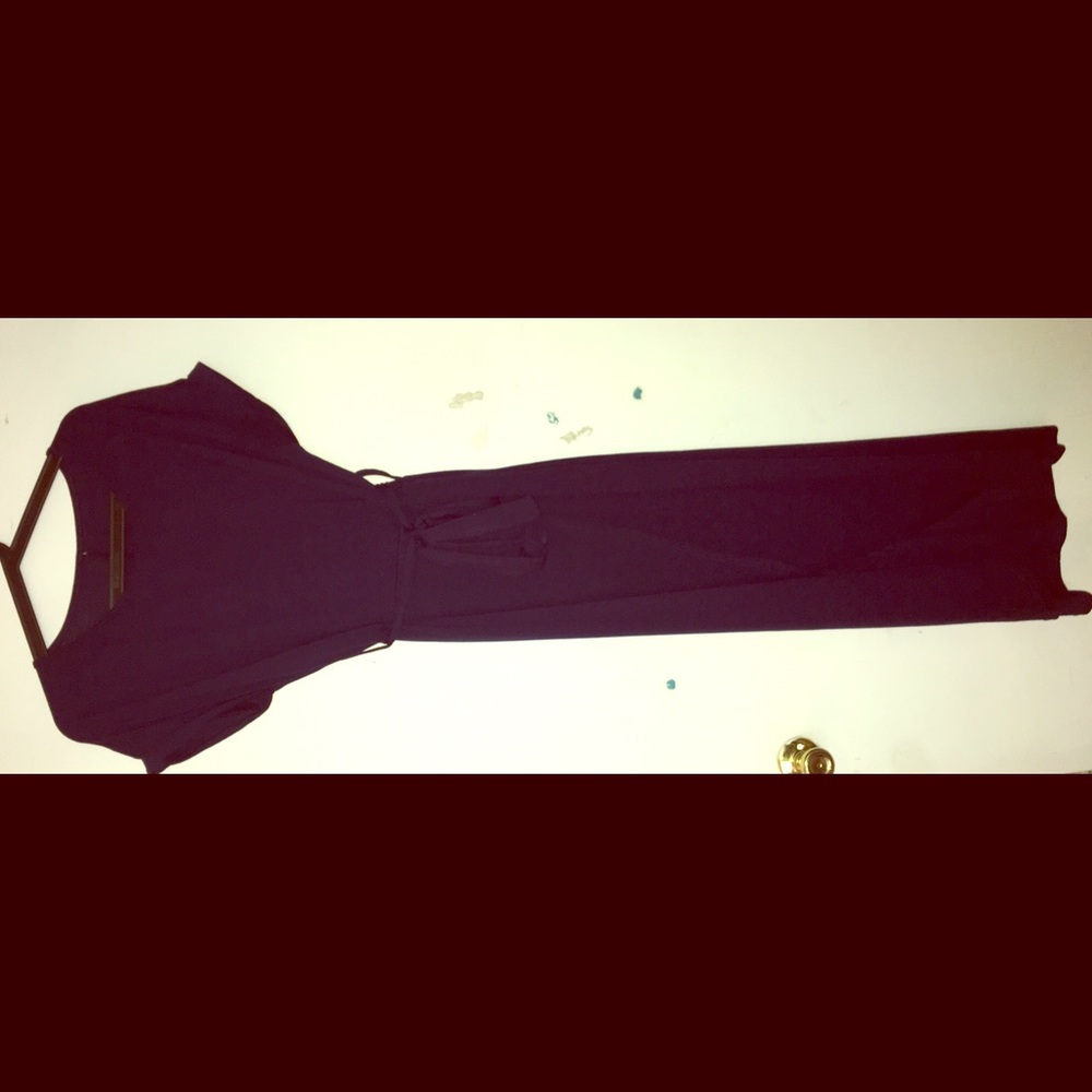 High low navy blue dress with a slit.