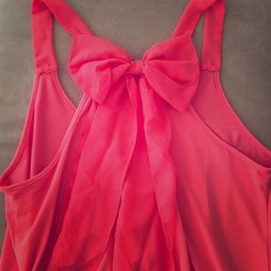 Super cute pink tank with bow back