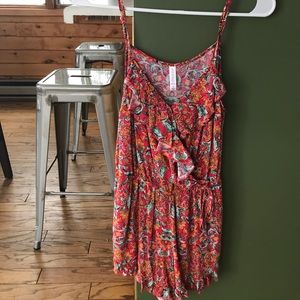 NEVER BEEN WORN. Cute Romper!