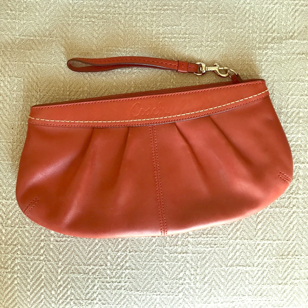 Coach leather wristlet - burnt orange