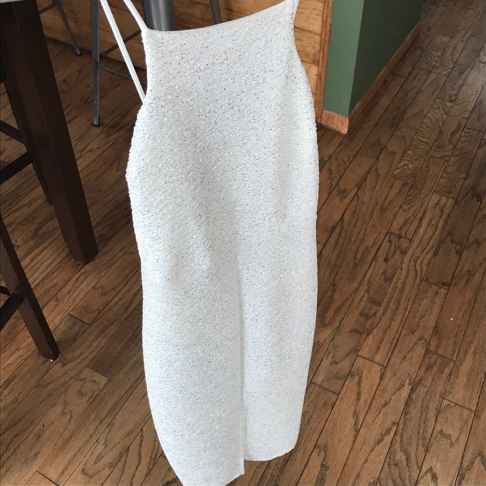 ONLY BEEN WORN ONCE. White dress.