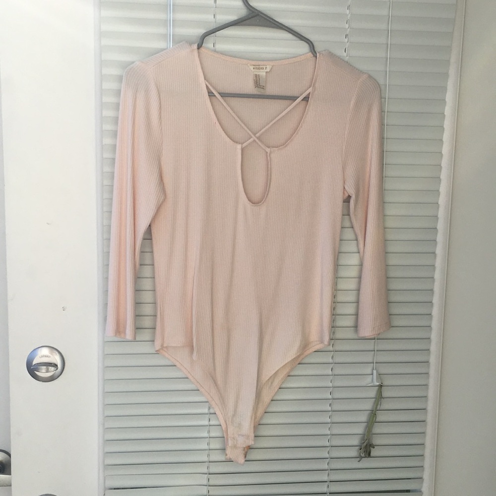 baby pink body suit