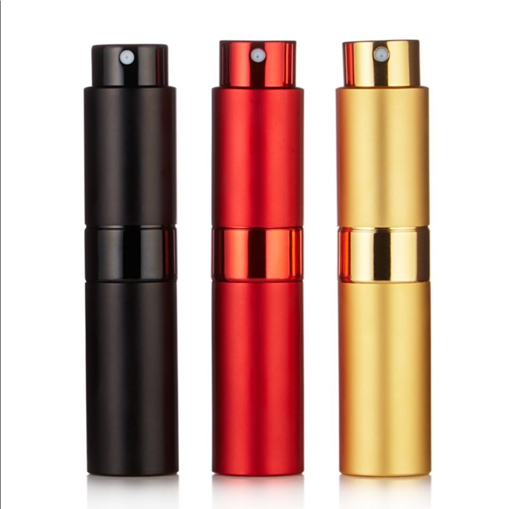 Refillable spray battle
