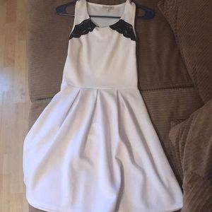 White dress with black lace details