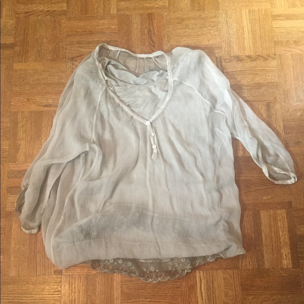 Tan blouse with lace undershirt