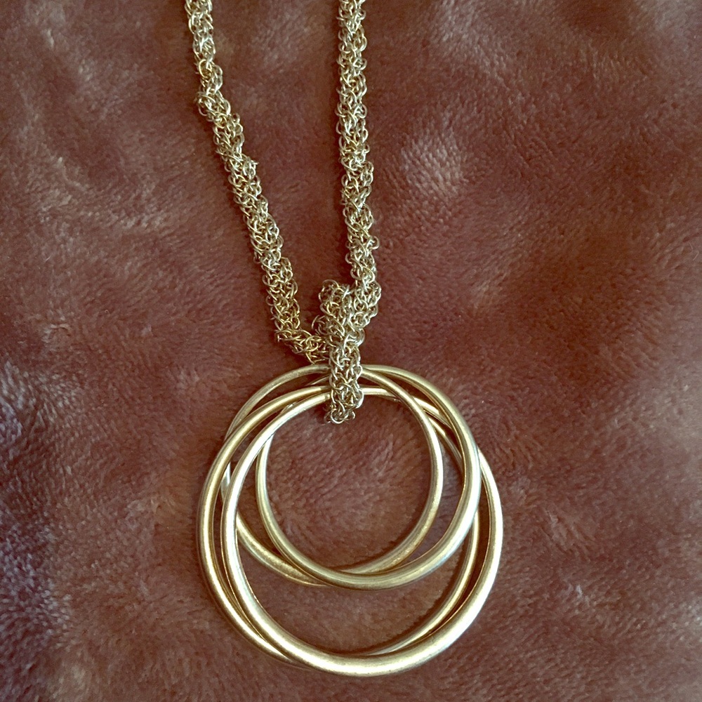 Long gold tone necklace