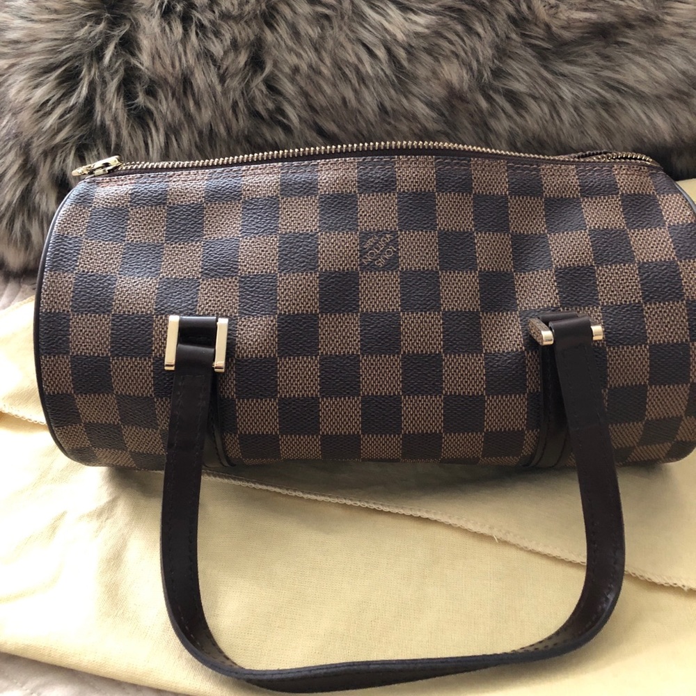 Small LV in perfect conditions no tags...