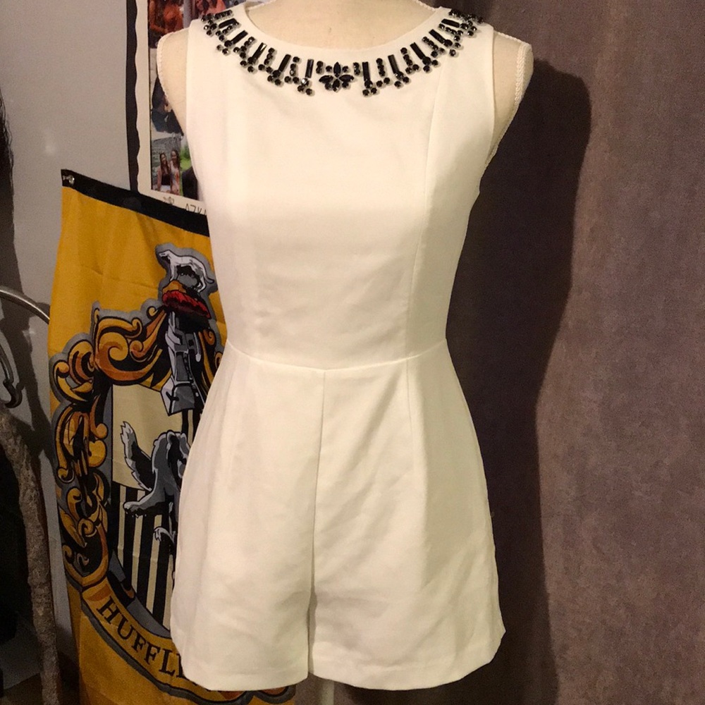White romper with black gemstones