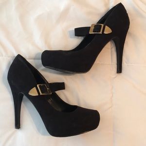 Black faux suede platform heels with gold buckle