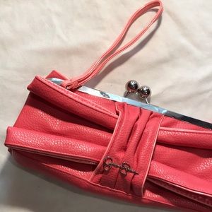 Jessica Simpson coral frame purse with wrist strap