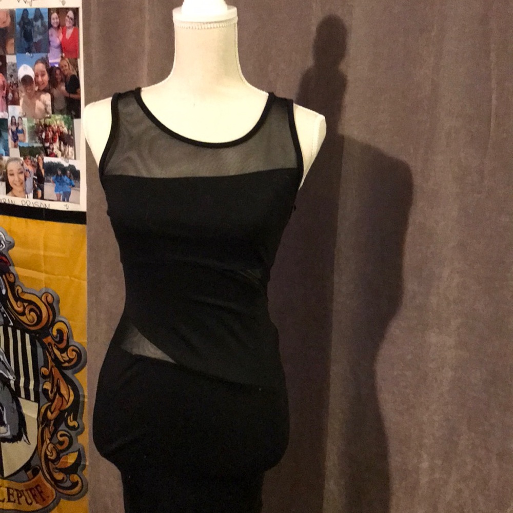 Black mini dress with sheer cutouts