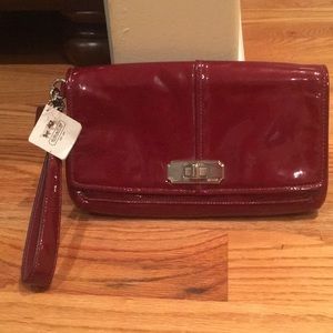 Coach cranberry clutch