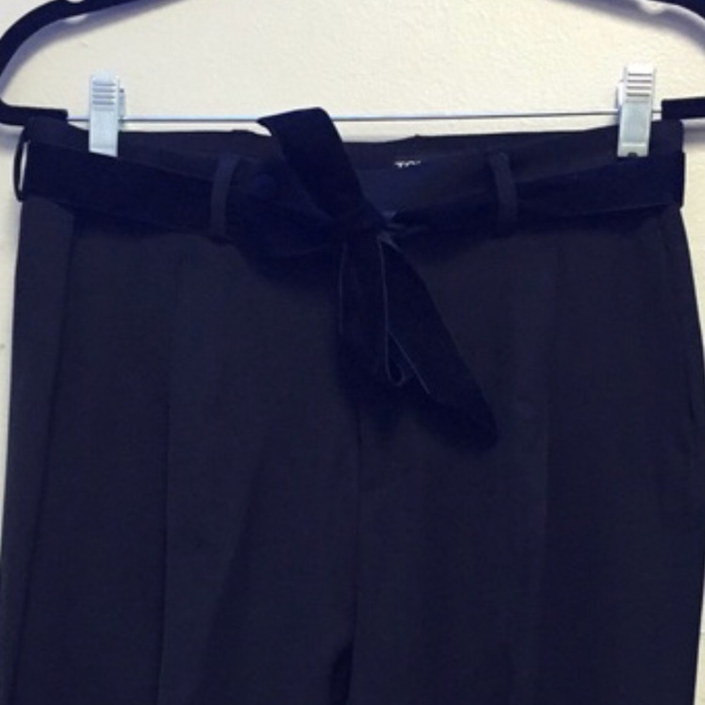 Tom Ford uniform black slacks with velvet tie belt