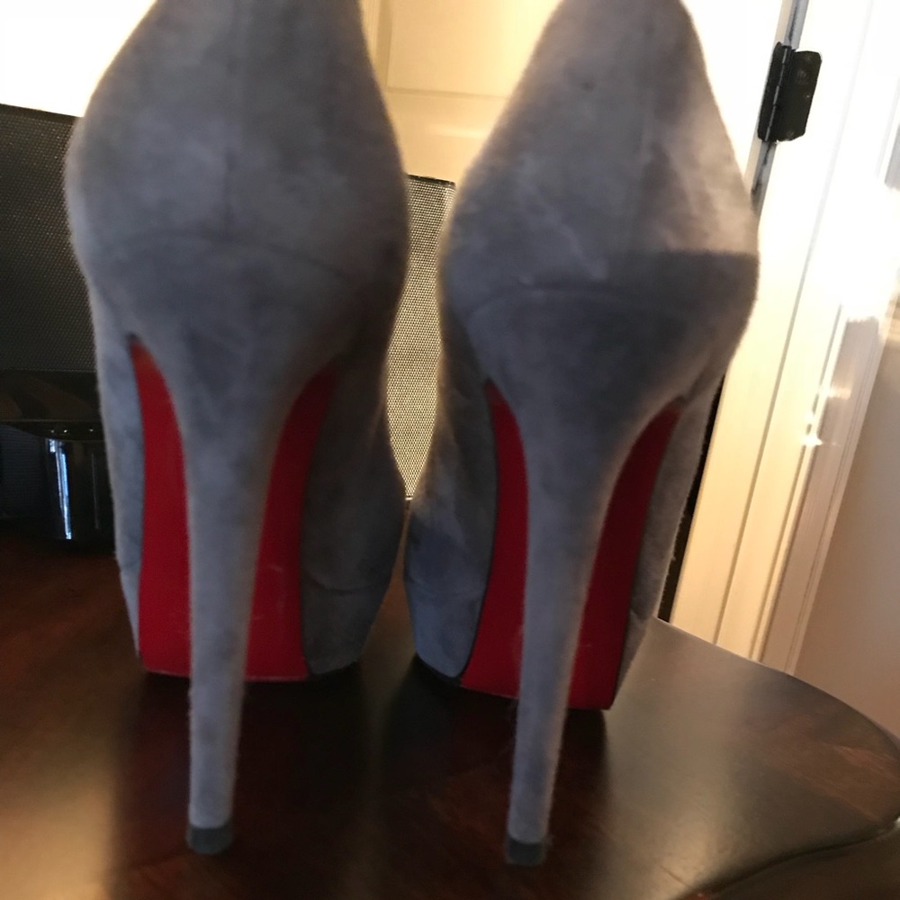 Christian Louboutin ash grey Bianca pumps.