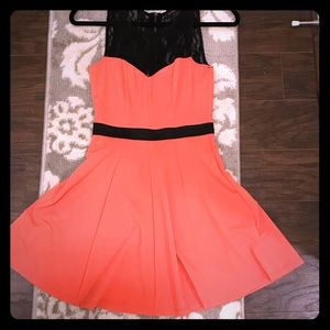 Black lace and peach fit and flare dress