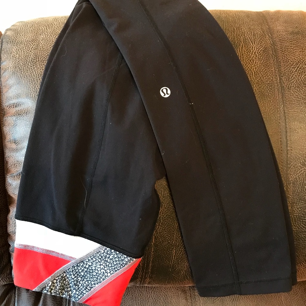 Lululemon full length boot-cut leggings.