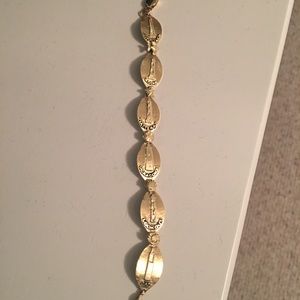 Gold bracelet with NC lighthouses
