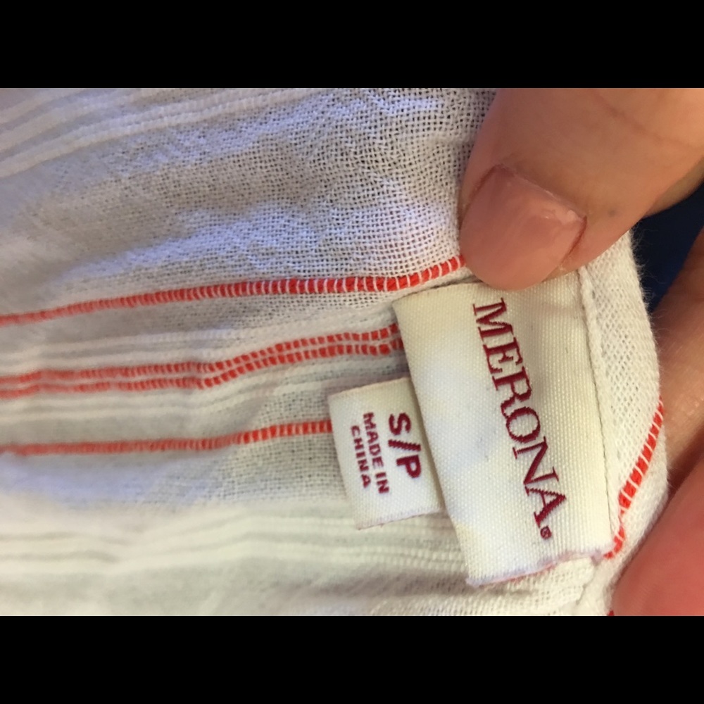 White blouse. With red stripes.