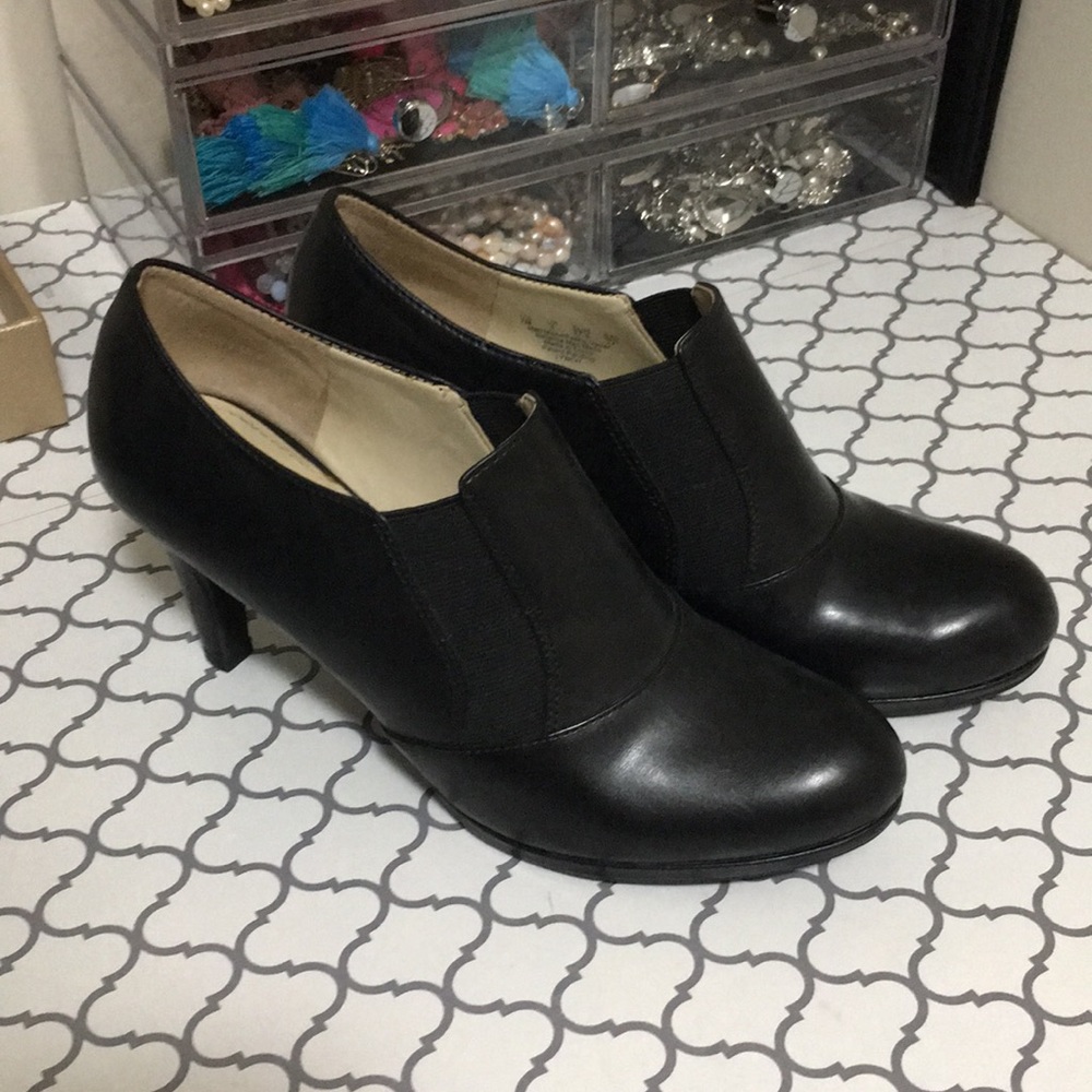 Black leather high heeled booties