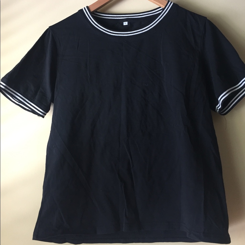 Black shirt with striped sleeve and neck line