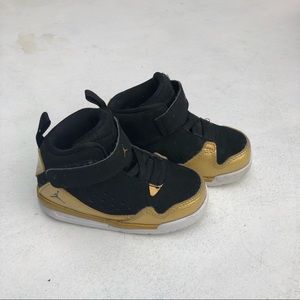 black and gold baby jordans
