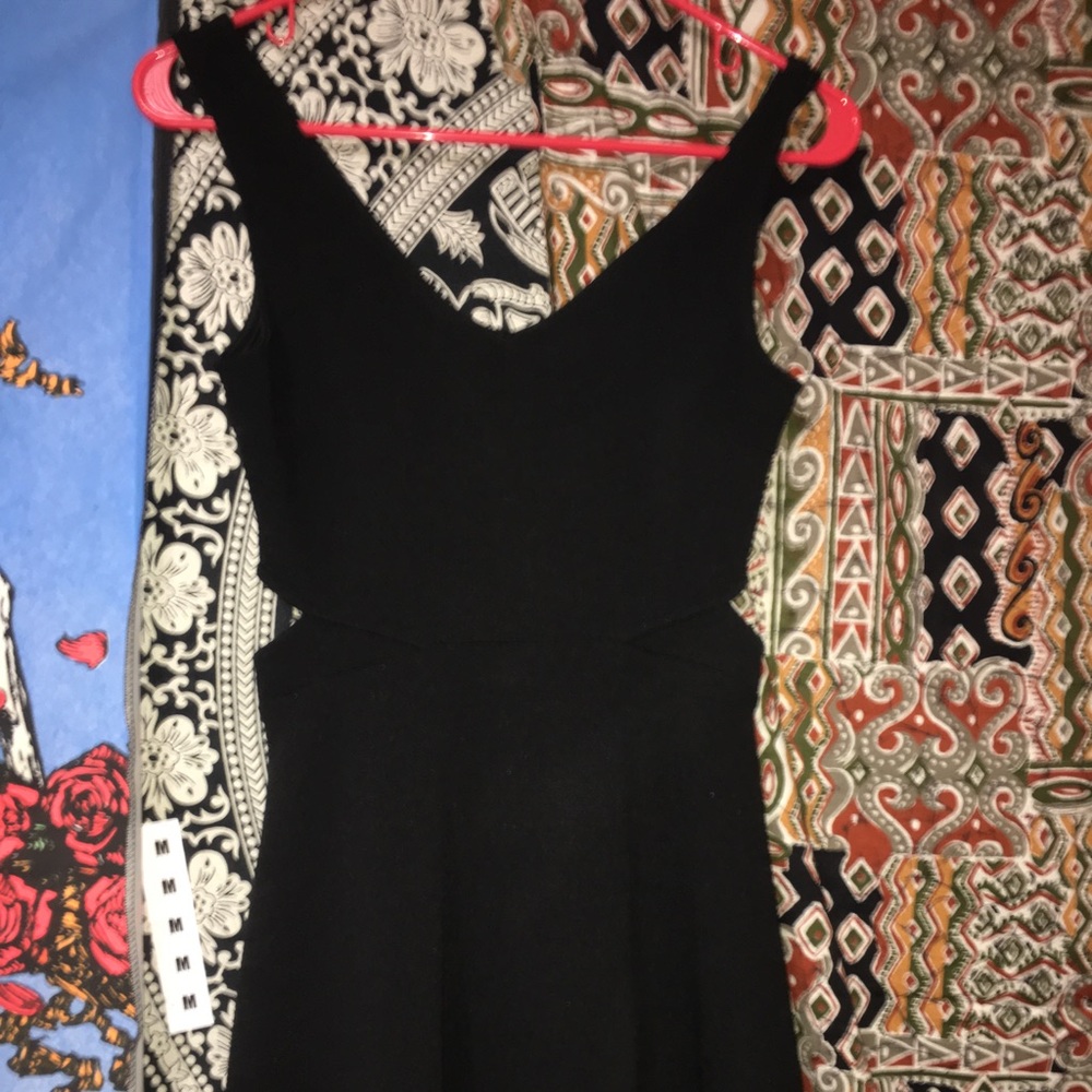 Black tight to flare dress